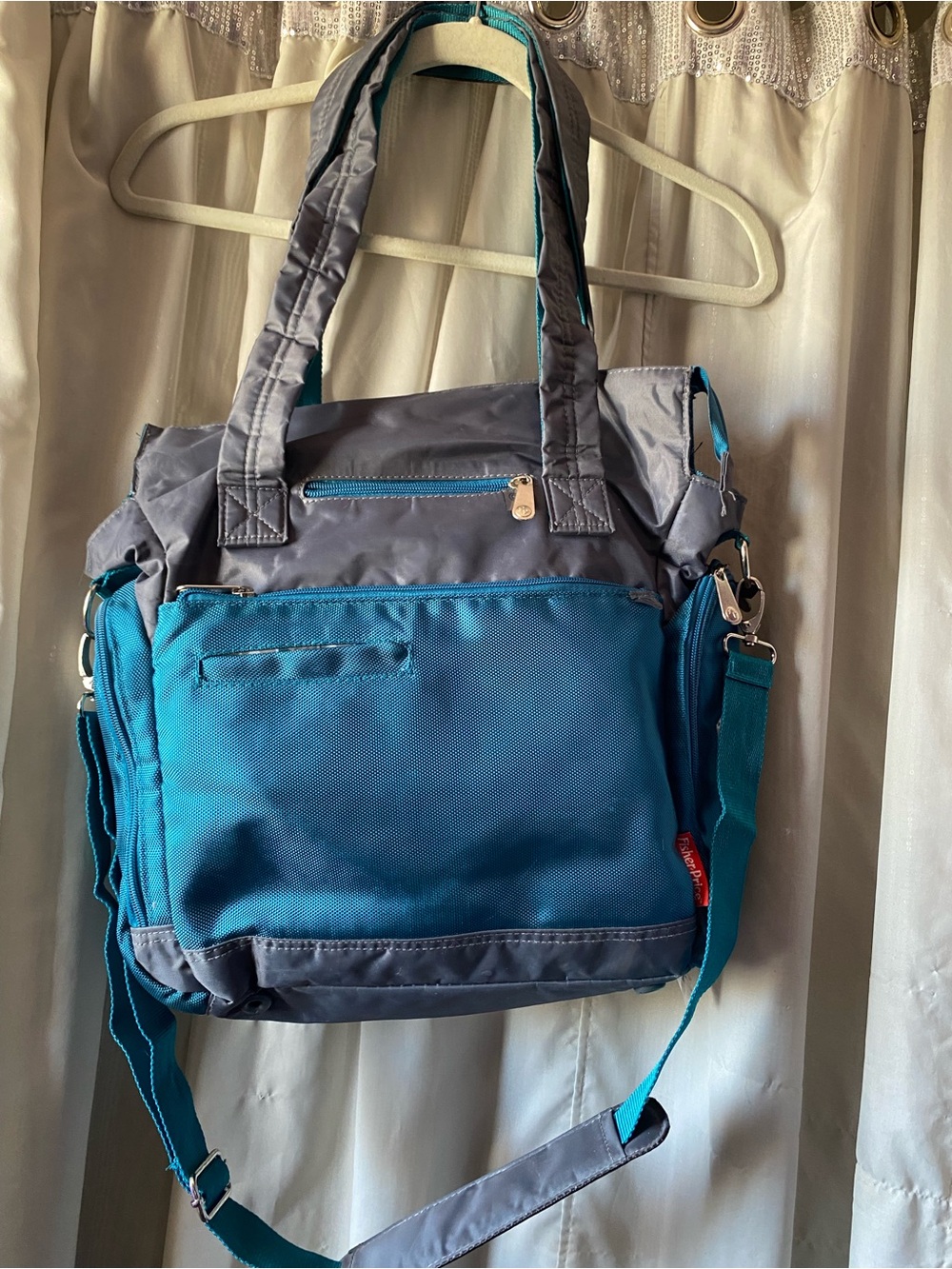 Fisher-Price Diaper Bag with Instant Wipe Access Changing Pad Insulated
Teal